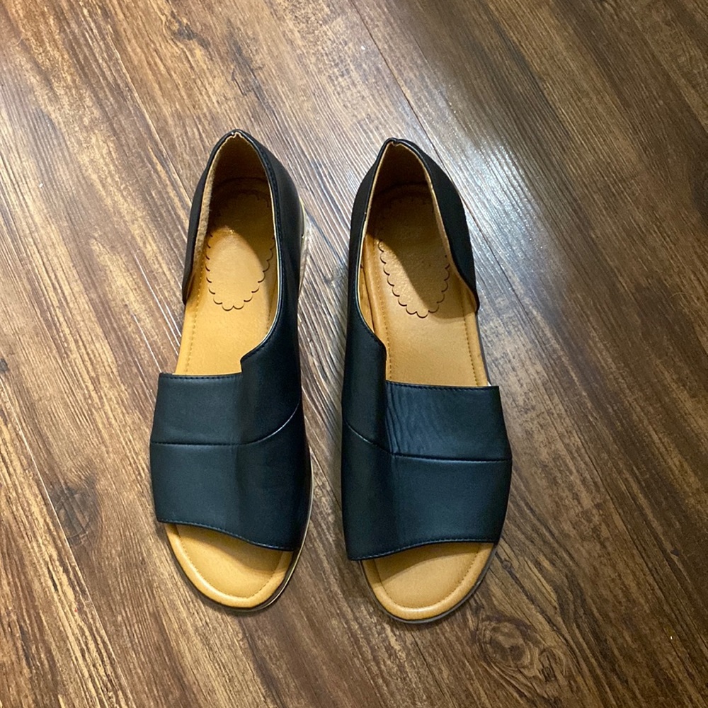 Black half open shoes